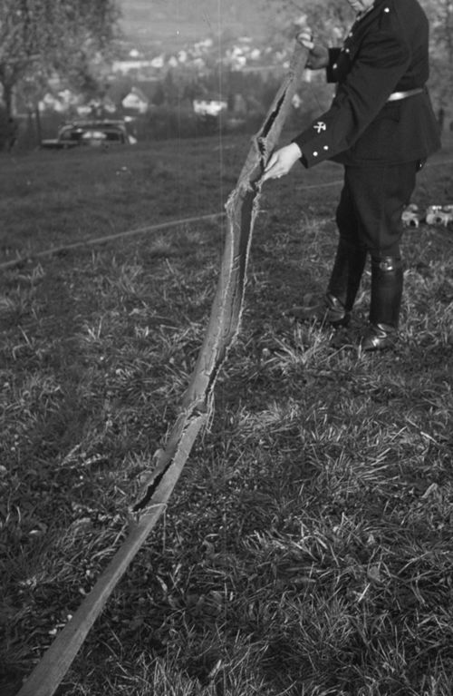 Fotografie, Feuerwehrkurs, defekter Schlauch