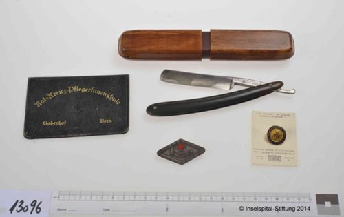 Urkunde; Abzeichen; Rasiermesser; Buch